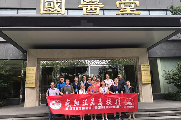 Students posting with the 'Insights to Jiangsu' banner